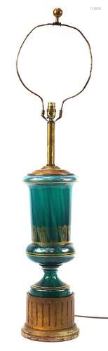 Green glass table lamp with gilded decoration and column bas...