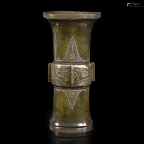 A gold and silver-inlaid and patinated bronze archaistic gu-...