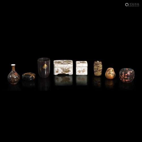 A group of eight assorted Japanese lacquer boxes and vases 日...