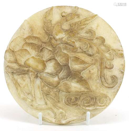 Chinese circular jade disc carved with a dragon and flower, ...