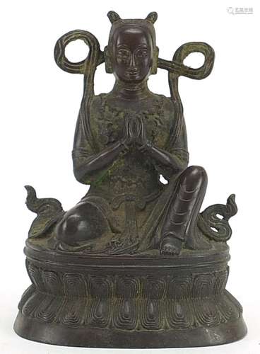 Tibetan patinated bronze figure of Buddha, 16cm high