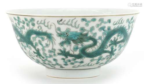 Chinese porcelain bowl decorated in green with dragons chasi...