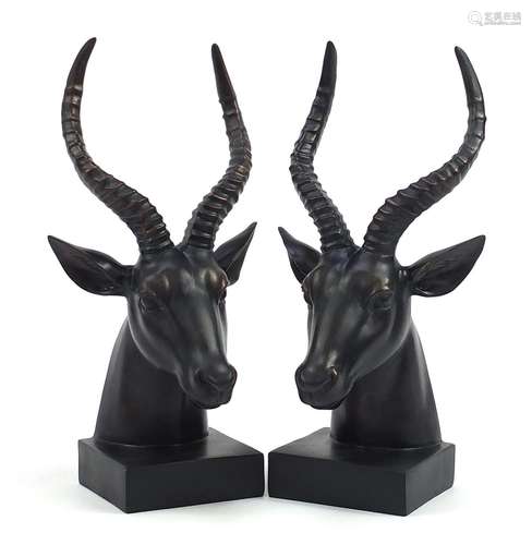 Pair of bronzed gazelle head bookends, 38cm high