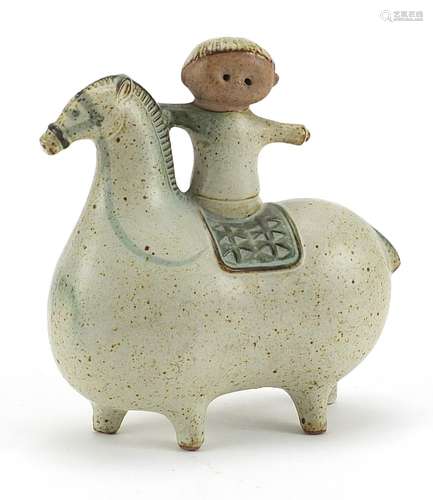 Scandinavian design pottery model of a boy on stylised horse...