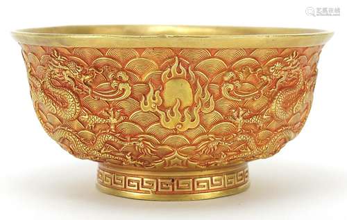 Chinese gilt bronze footed bowl cast with dragons amongst cl...