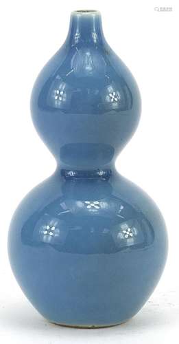 Chinese porcelain double gourd vase having a blue glaze, cha...