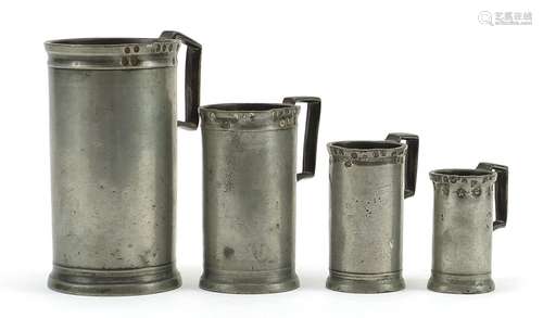 Graduated set of four antique pewter measures, indistinct ma...