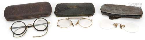 Three pairs of steel cased vintage spectacles including Doll...