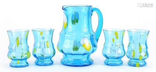 Blue glass lemonade jug and four glasses, the jug 20cm high