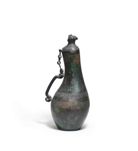 A RARE ARCHAIC BRONZE GOURD-SHAPED VASE AND COVER, HU Easter...