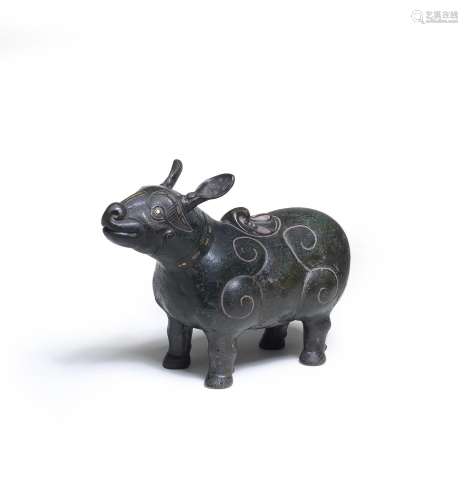 A VERY RARE GOLD AND SILVER-INLAID BRONZE TAPIR-SHAPED VESSE...