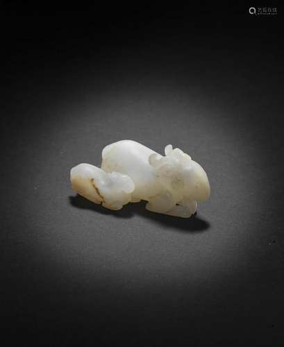 A WHITE JADE CARVING OF A RAM AND YOUNG Ming Dynasty