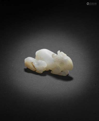 A WHITE JADE CARVING OF A RAM AND YOUNG Ming Dynasty