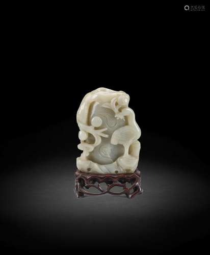 A CARVED PALE GREEN JADE 'CRANE AND LINGZHI' VASE 17...