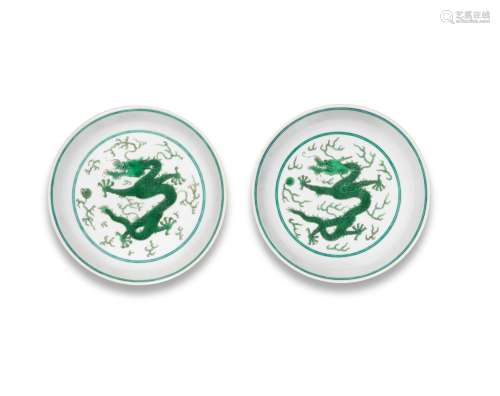 A RARE PAIR OF GREEN ENAMELLED 'DRAGON' SAUCER DISHE...