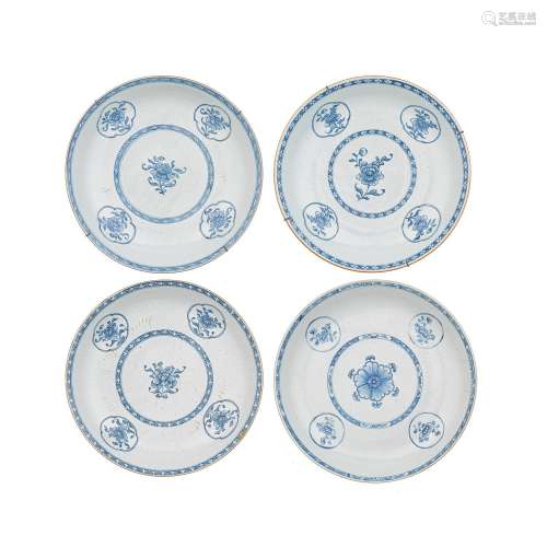 A SET OF FOUR BLUE AND WHITE FLORAL DISHES Kangxi