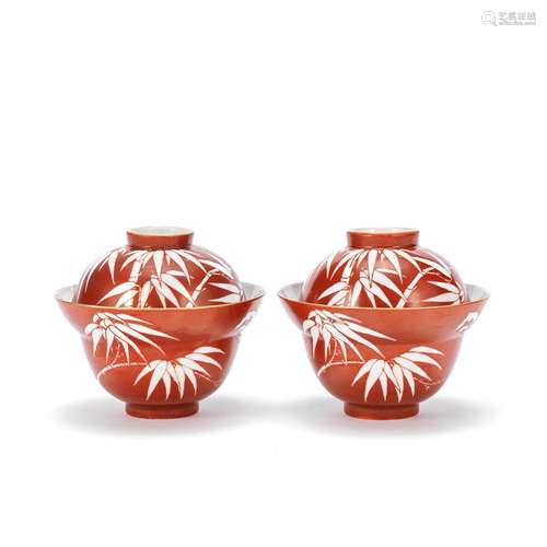 A PAIR OF CORAL-GROUND BOWLS AND COVERS Master of Bamboo mar...