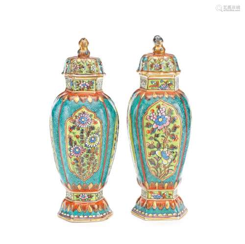 A PAIR OF CLOBBERED VASES AND COVERS Kangxi