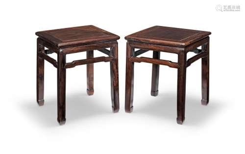 A PAIR OF MING-STYLE HONGMU WAISTED CORNER LEG STOOLS 19th c...