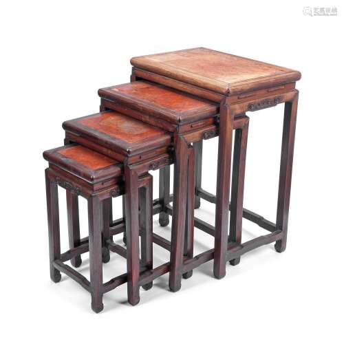 A NEST OF FOUR GRADUATING HONGMU BURLWOOD-INSET TABLES Circa...