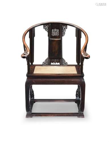 A LARGE HUANGHUALI HORSESHOE-BACK ARMCHAIR 18th/19th century