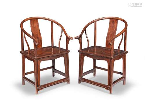 A PAIR OF HUANGHUALI HORSESHOE-BACK ARMCHAIRS, QUANYI 19th c...
