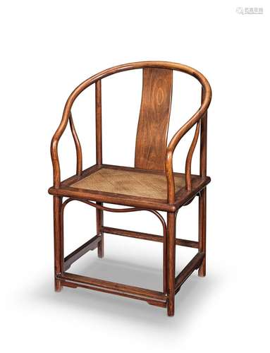 A HUANGHUALI CONTINUOUS HORSESHOE-BACK ARMCHAIR, QUANYI 18th...