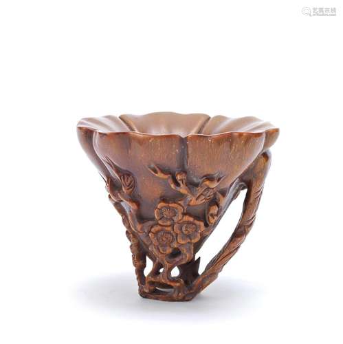 A CARVED BUFFALO HORN LIBATION CUP 19th century