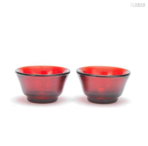 A PAIR OF RUBY RED GLASS BOWLS Incised Qianlong four-charact...