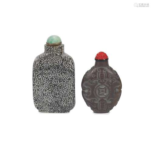A CARVED DUAN STONE SNUFF BOTTLE AND A LIMESTONE SNUFF BOTTL...
