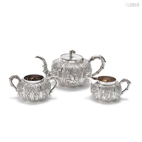 A CHINESE EXPORT SILVER THREE-PIECE TEA SERVICE