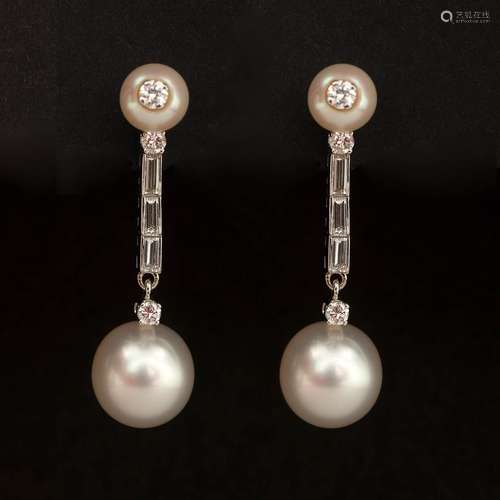 Ravissante paire de boucles d'oreilles en or blanc 14 carats...