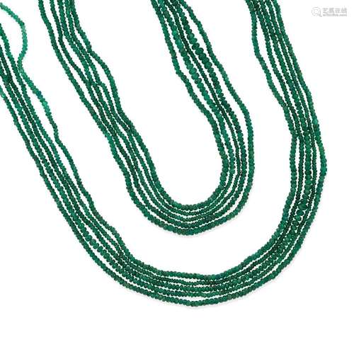 Five loose emerald strands