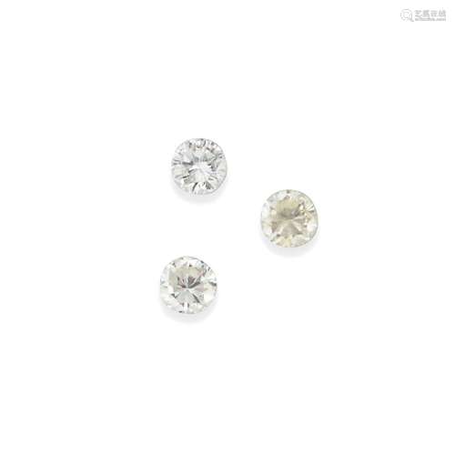 Three unmounted diamonds