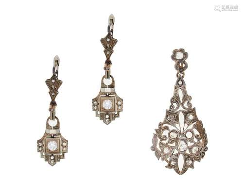 diamond pair of earrings and a pendant