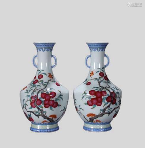 A pair of enamel flower and poetry amphora