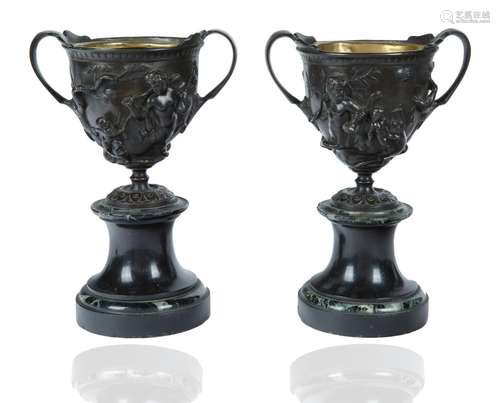 A PAIR OF 19TH CENTURY BRONZE AND STONE CHALICES