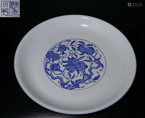 CHINESE BLUE-AND-WHITE CHARGER DEPICTING 'PEACH AND FLOW...