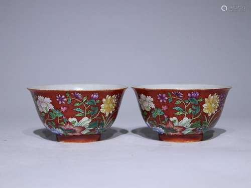 TWO CHINESE RED-GROUND POLYCHROME ENAMEL BOWLS DEPICTING ...