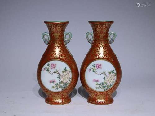 TWO CHINESE GILDED ON RED-GROUND POLYCHROME ENAMEL VASES DEP...