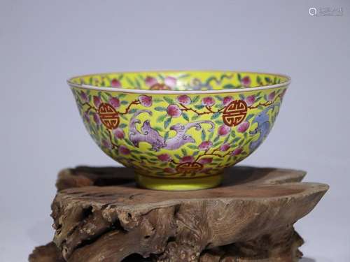 CHINESE YELLOW-GROUND FAMILLE-ROSE BOWL DEPICTING 'BAT A...