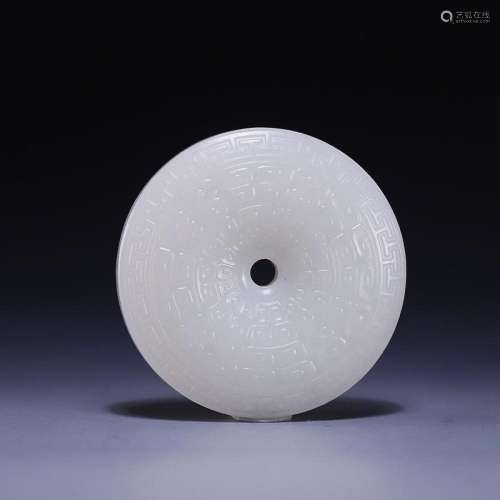 CHINESE HETIAN JADE BI DISC WITH CARVED 'CLOUDS'