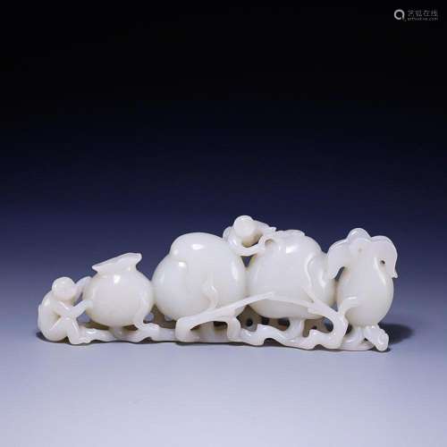 CHINESE HETIAN JADE BRUSHREST WITH CARVED 'MONKEY'