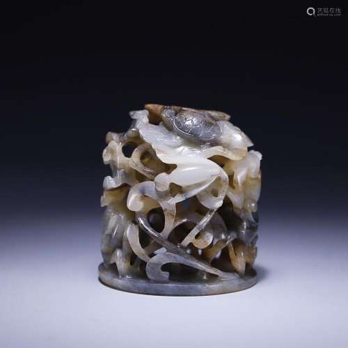 CHINESE HETIAN BLACK-AND-WHITE JADE KNOB WITH CARVED 'TO...
