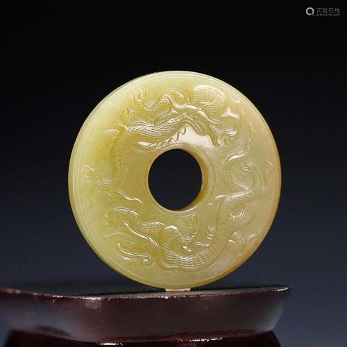 CHINESE HETIAN YELLOW JADE BI DISC WITH CARVED 'DRAGON A...