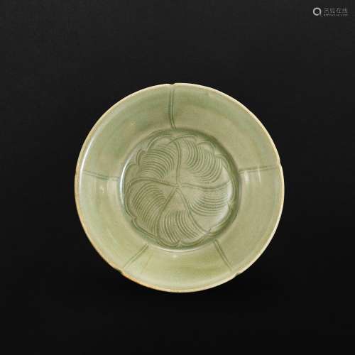 A Longquan celadon carved 'floral' dish, Northern So...