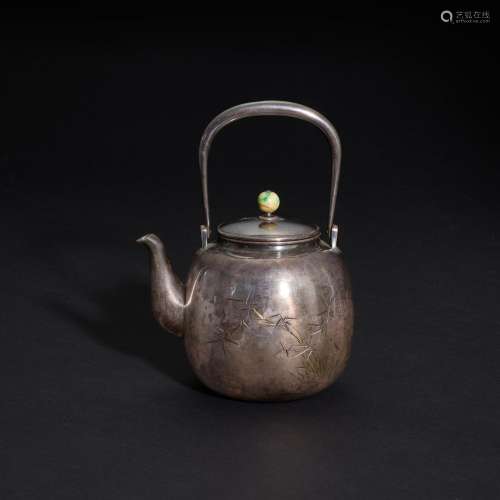 A parcel-gilt silver 'prunus and bamboo' kettle, Jap...