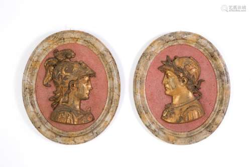 Pair of oval resin medallions