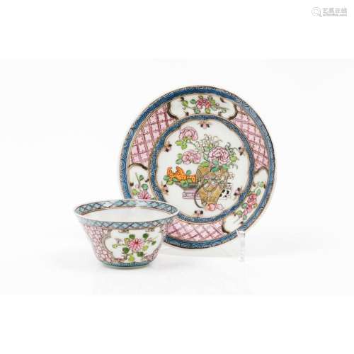 A tea bowl and saucer