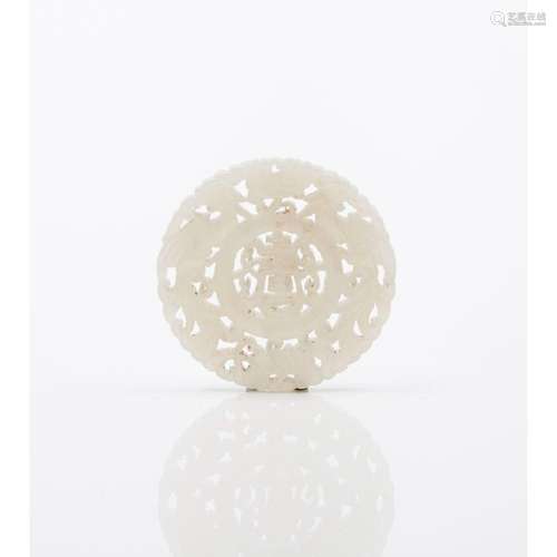 A white jade round plaque